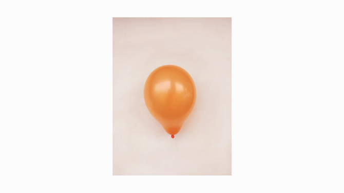 A balloon with a simple tied knot and string
