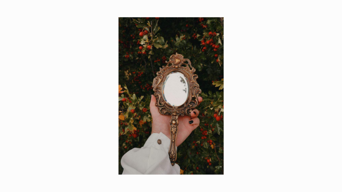 A simple hand mirror reflecting light