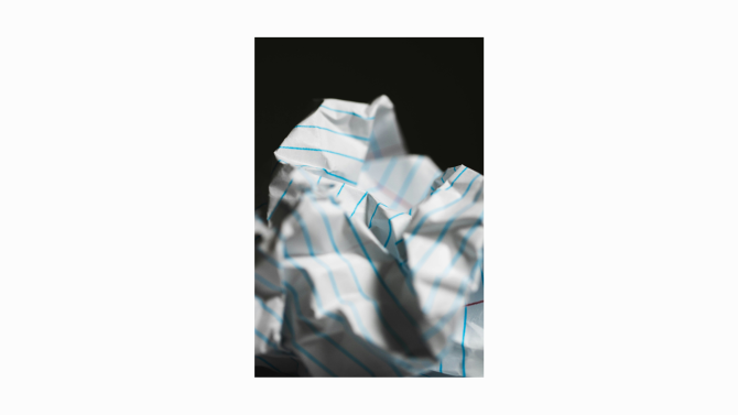 A crumpled sheet of paper with visible creases