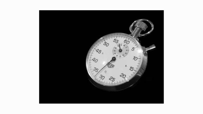 A stopwatch with a top button and clear dial