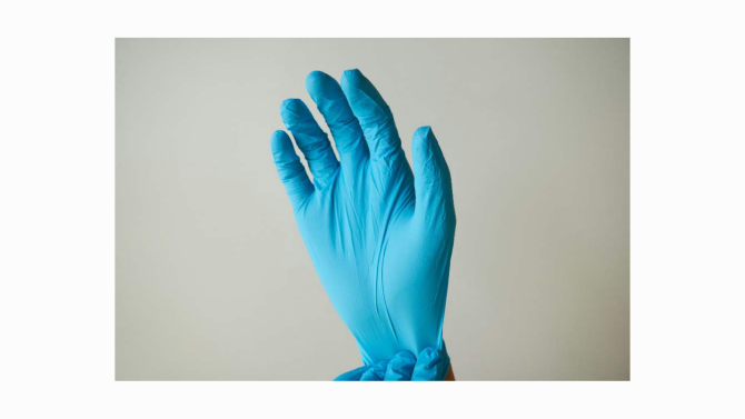 A single rubber glove with five fingers